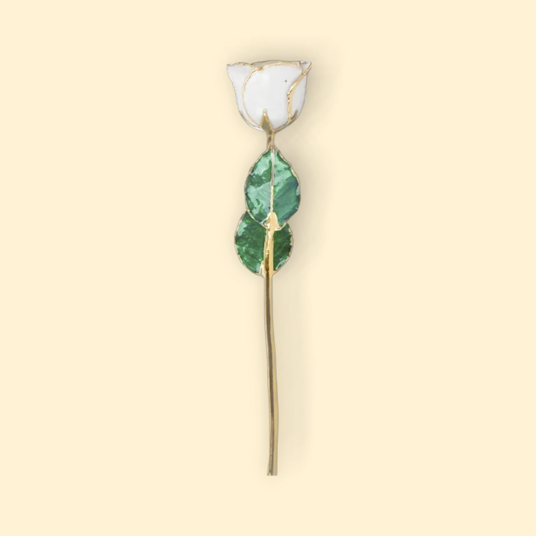 Decorative rose with green leaves and gold accents on a beige background