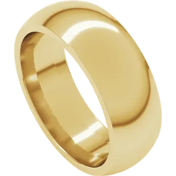 Gold ring on a dark wooden surface