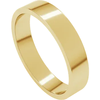 Gold ring on a dark wooden surface