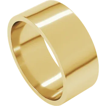 Gold ring on a dark wooden surface