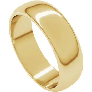 Gold ring on a dark wooden surface