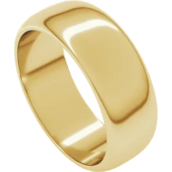 Gold ring on a dark wooden surface